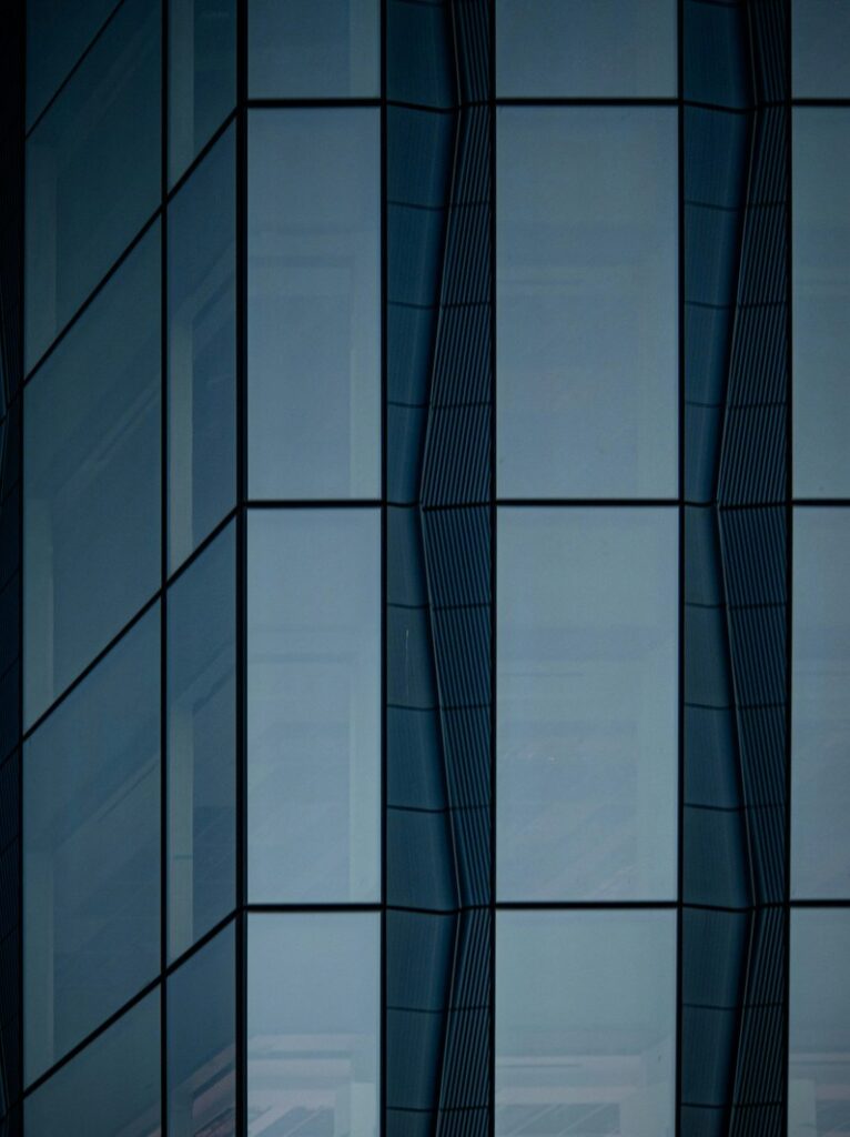 Reflective glass office building with commercial window tinting film in New Jersey